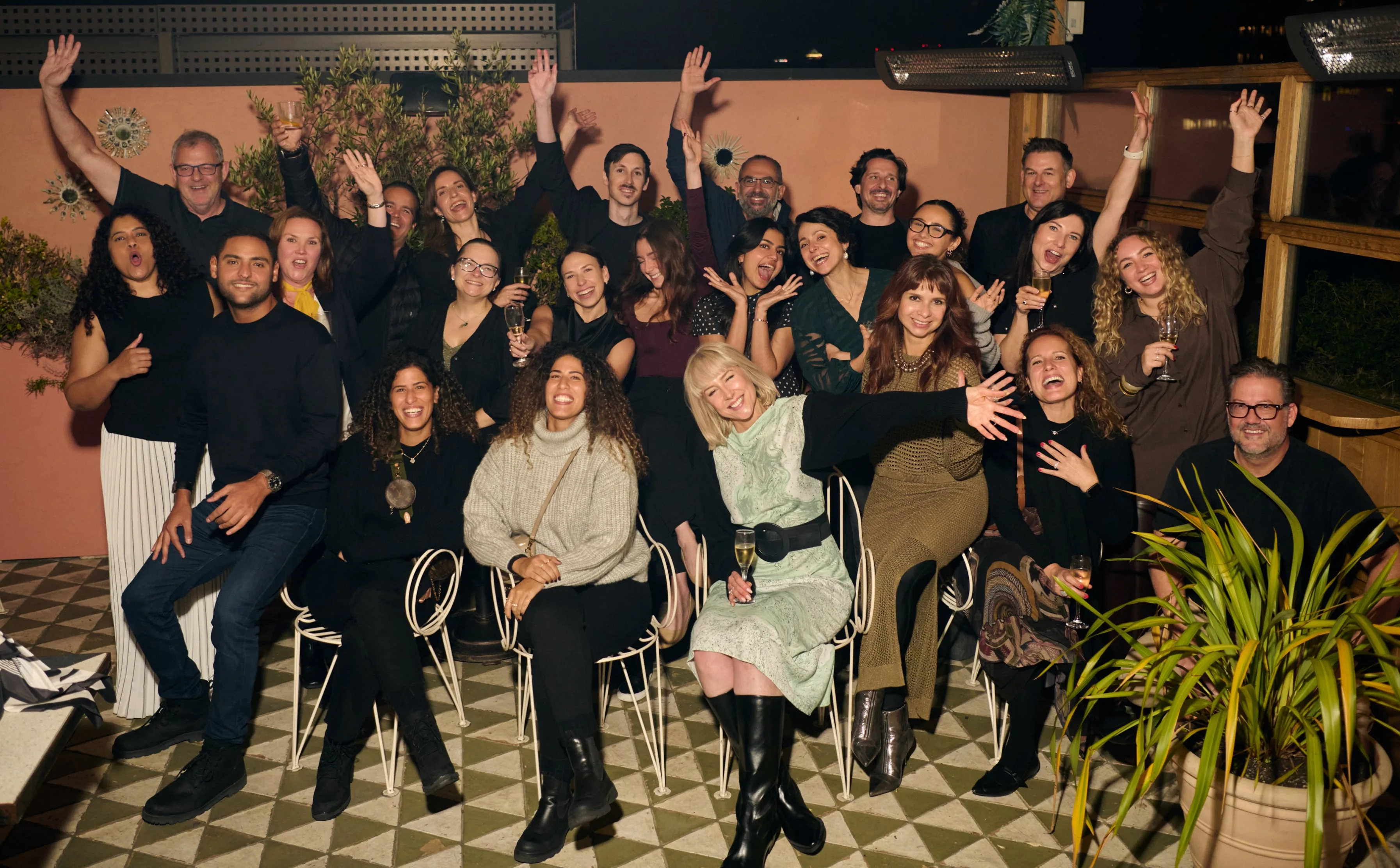 The OBMI team, some fifty people, gathered in a hotel lobby