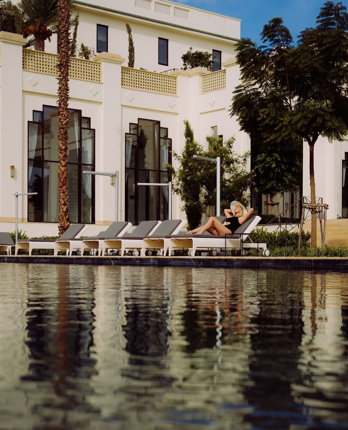A woman by the Pool on Tazi Palace