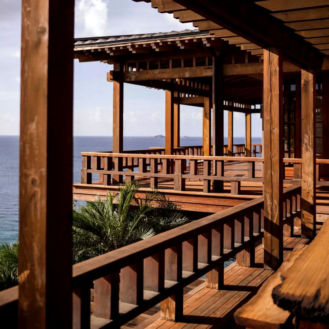 A tiled pavilion over the channel at dusk