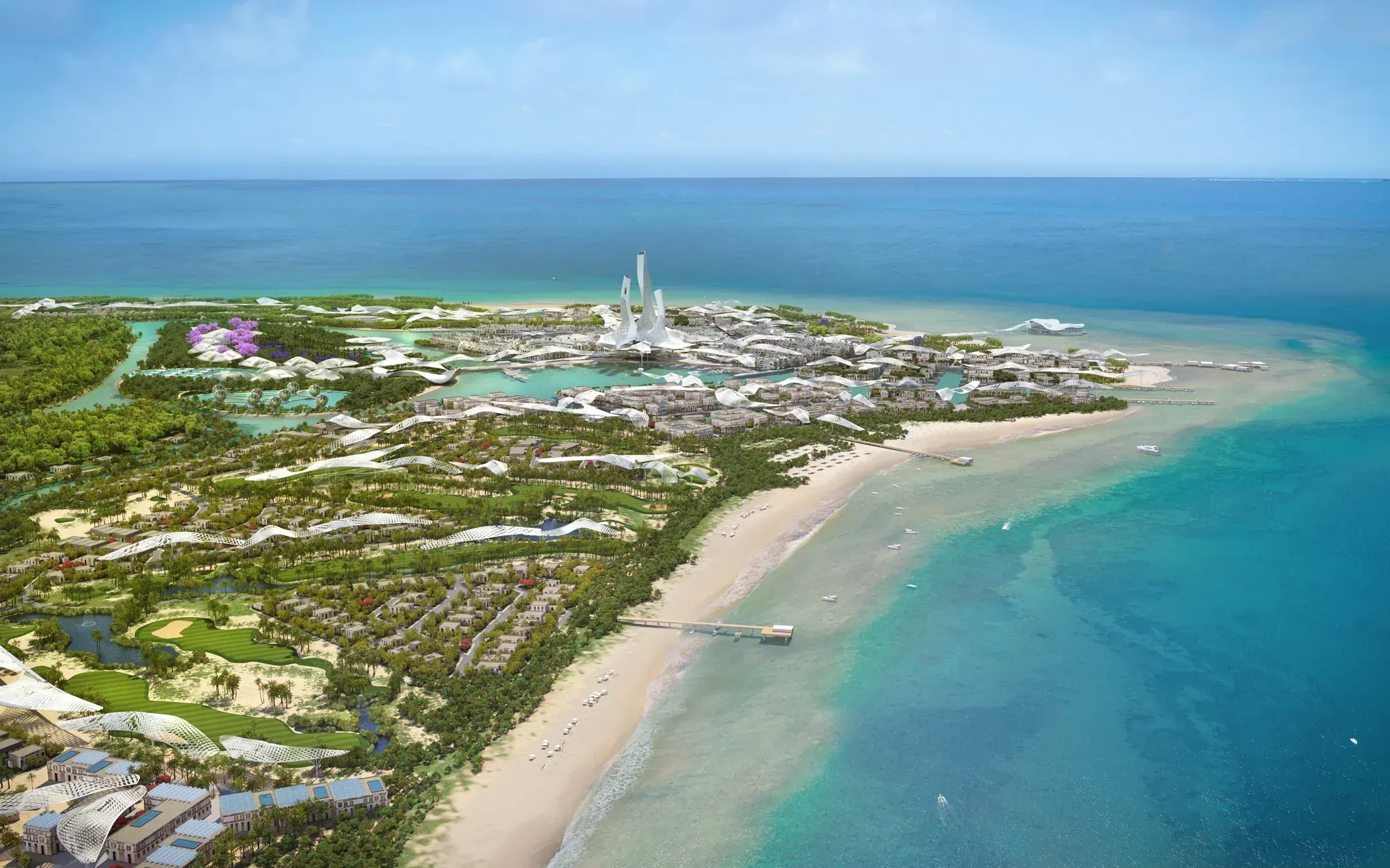 The island from the air: the towers at its heart, the golf course and villages along the beach