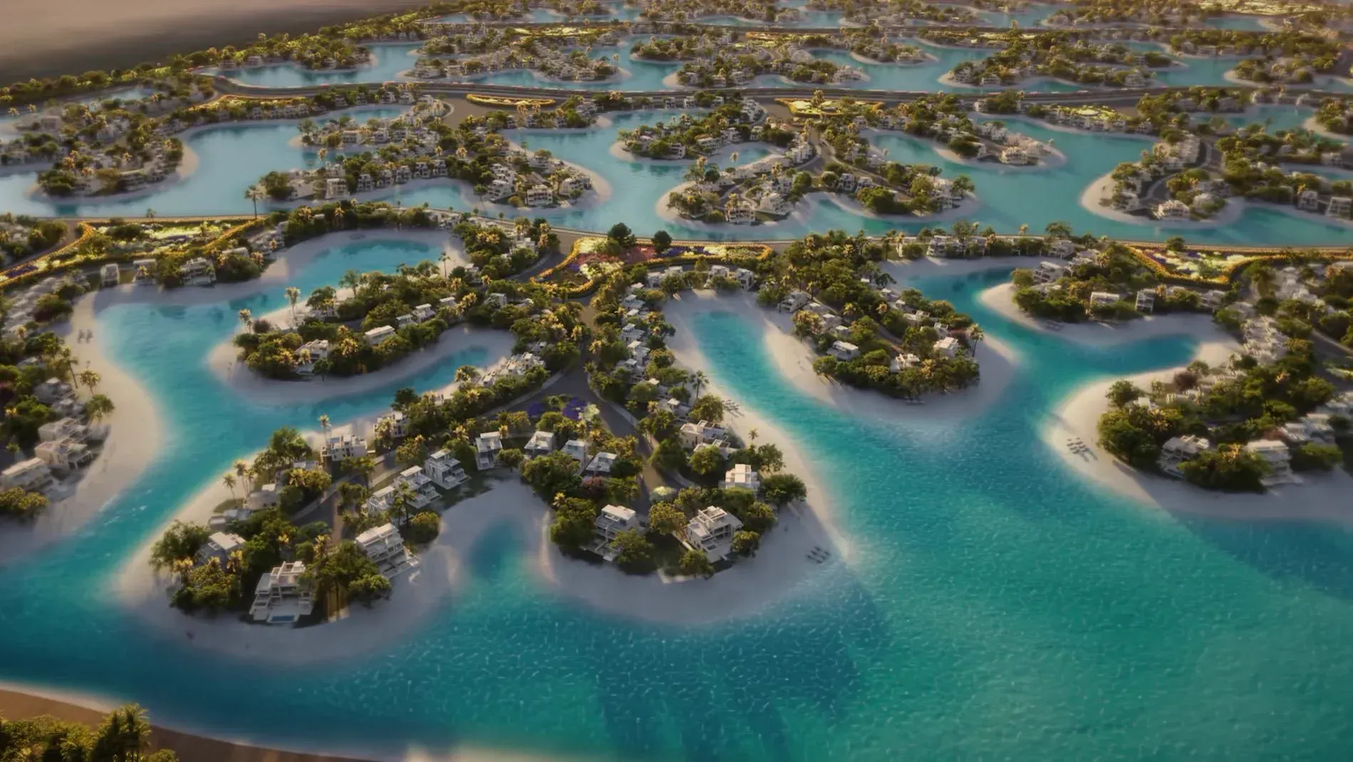 Islands of villas in turquoise lagoons from the air, sand banks curving between them