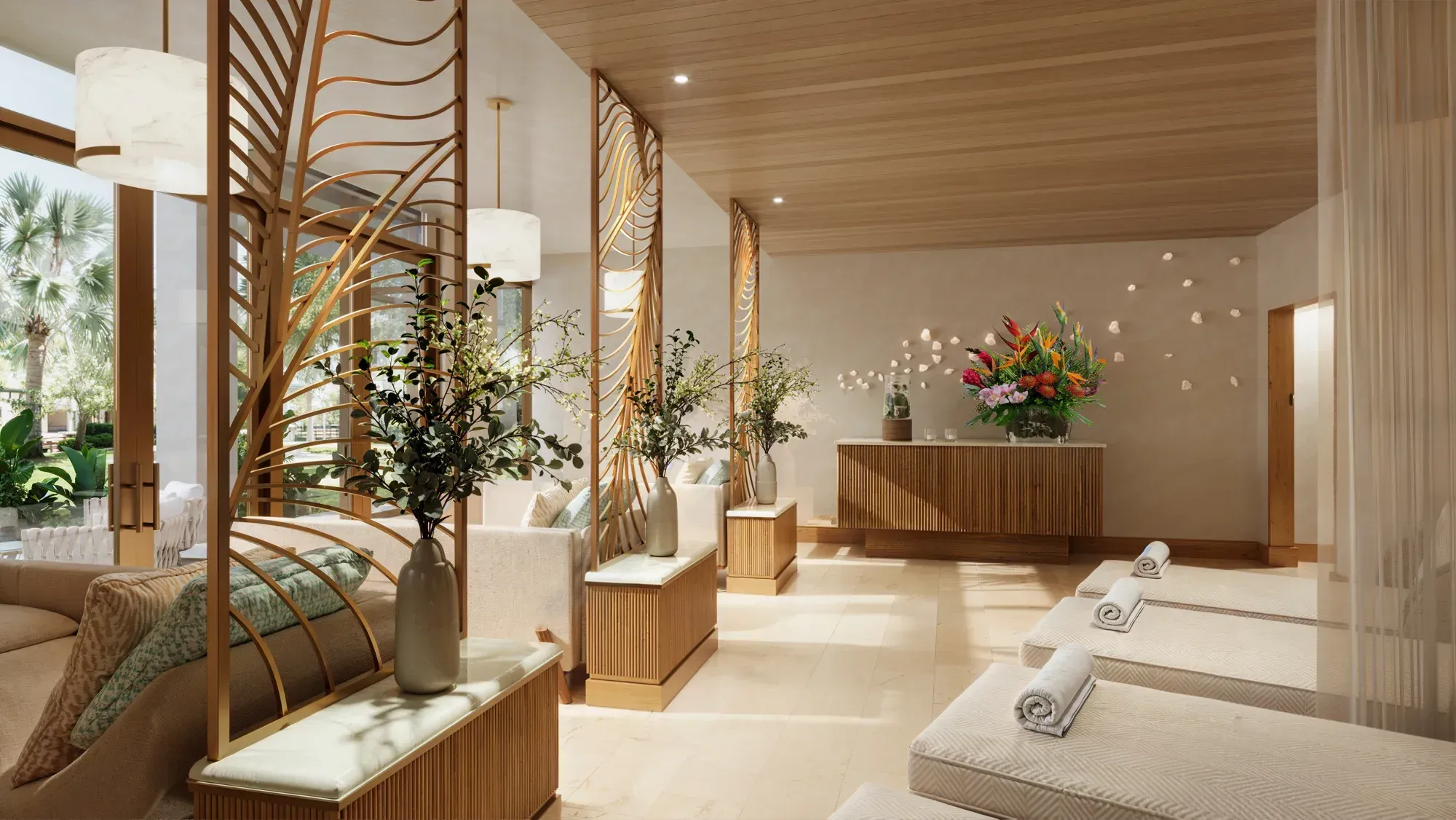 The relaxation room: brass leaf screens between loungers, orchids on the sideboard