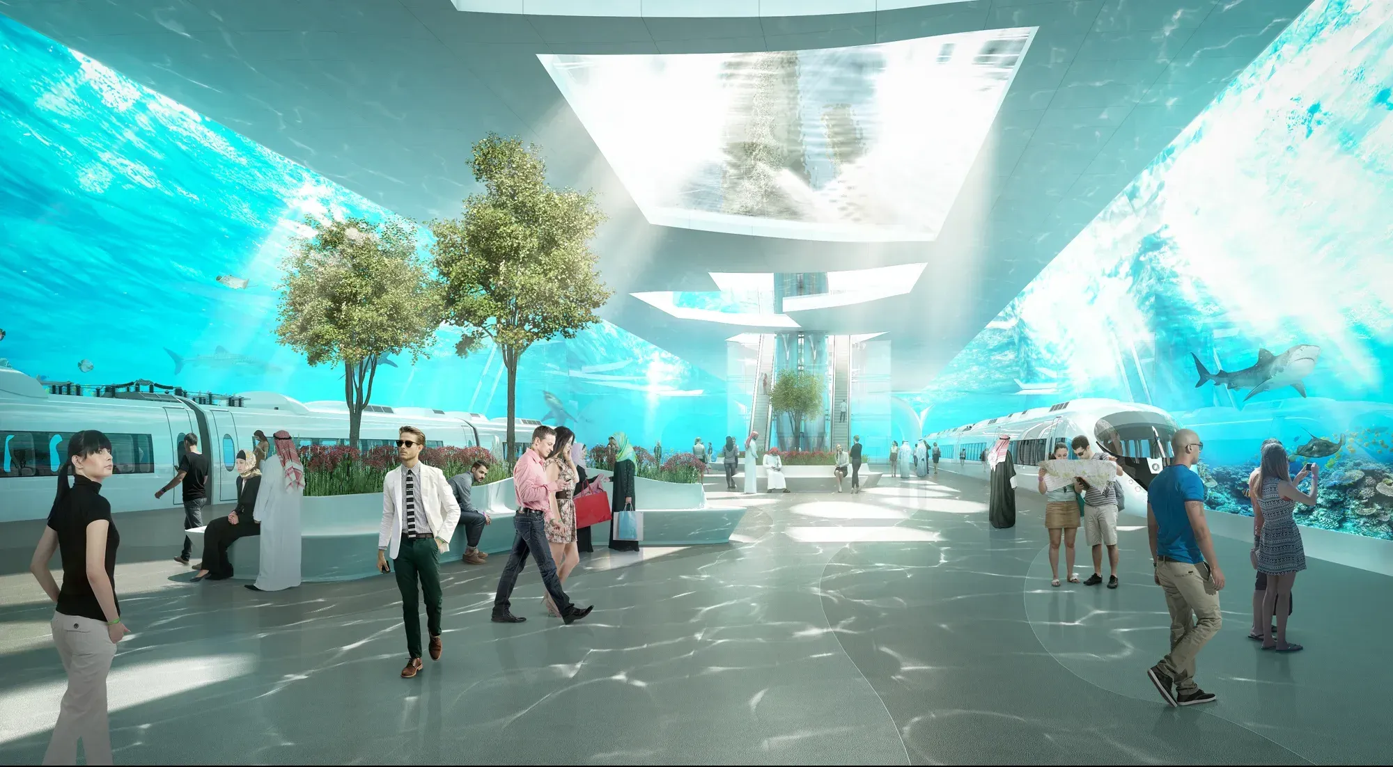 A station hall with the sea projected across its walls and ceiling, trains either side, people crossing
