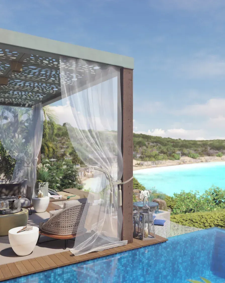 A villa terrace under a perforated canopy, curtains drawn, the crescent beach below