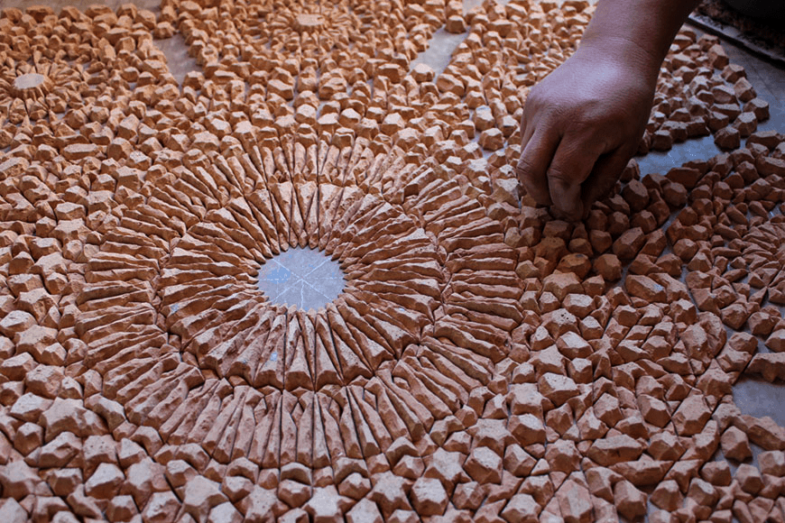 A hand crafting Zellige tilework
