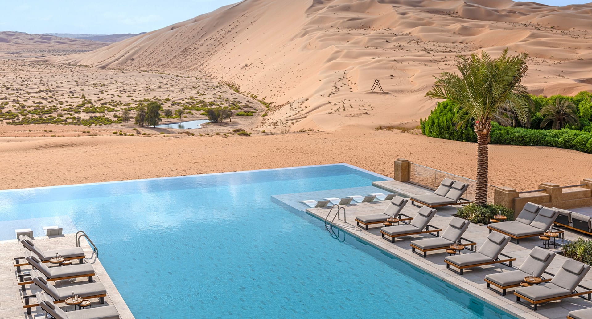 qasr_al_sarab_desert_resort_by_anantara_infinity_pool_-1920x1037